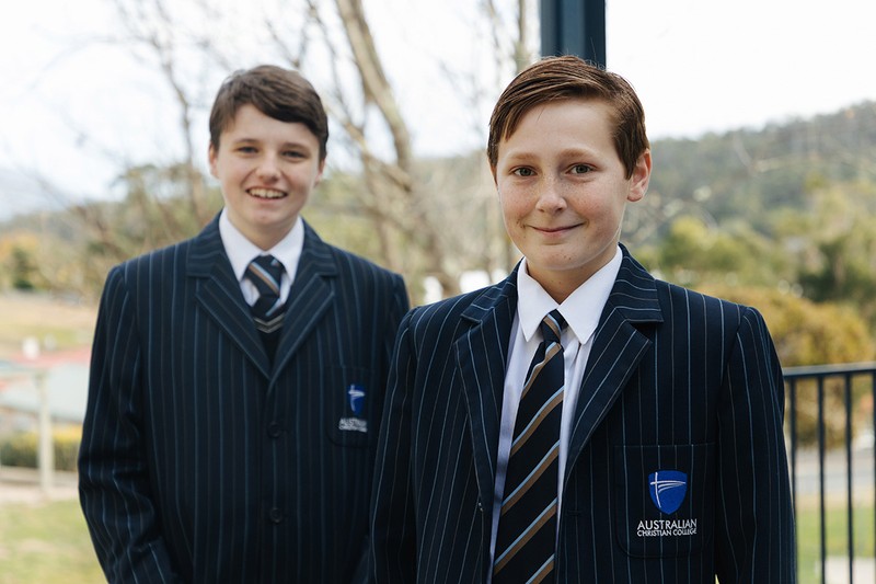 ACC Hobart high school students wearing formal school uniform with blazers