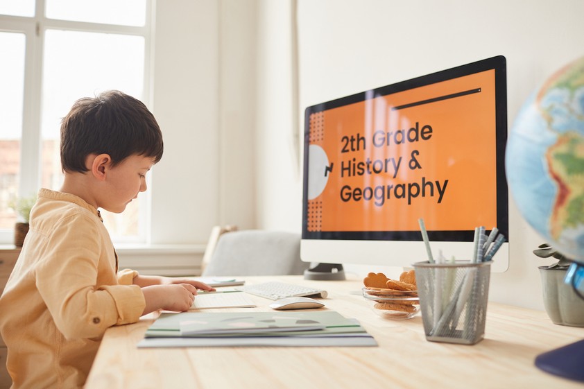 Year-2-boy-student-doing-a-history-&-geography-online-lesson