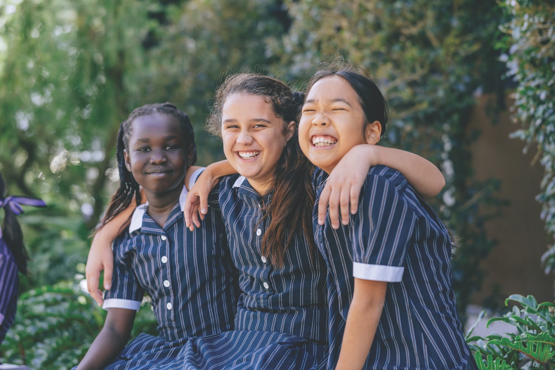 School girls laughing in school uniform in Somerset Tasmania