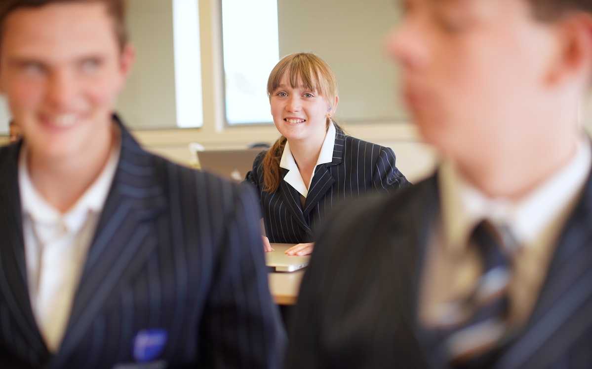 female high school student in classroom