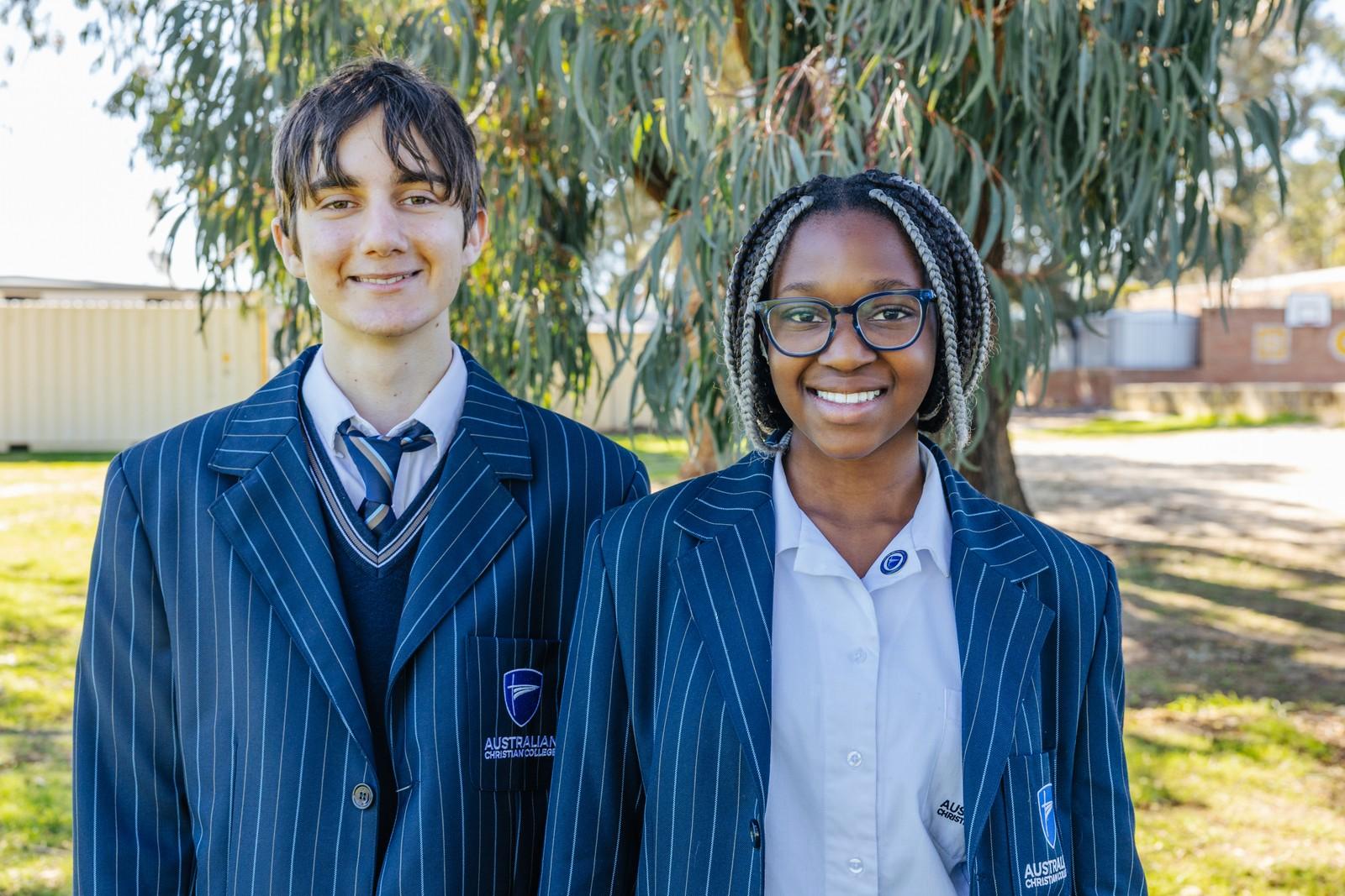 A teacher and student connecting one on one, building the confidence that comes from belonging.