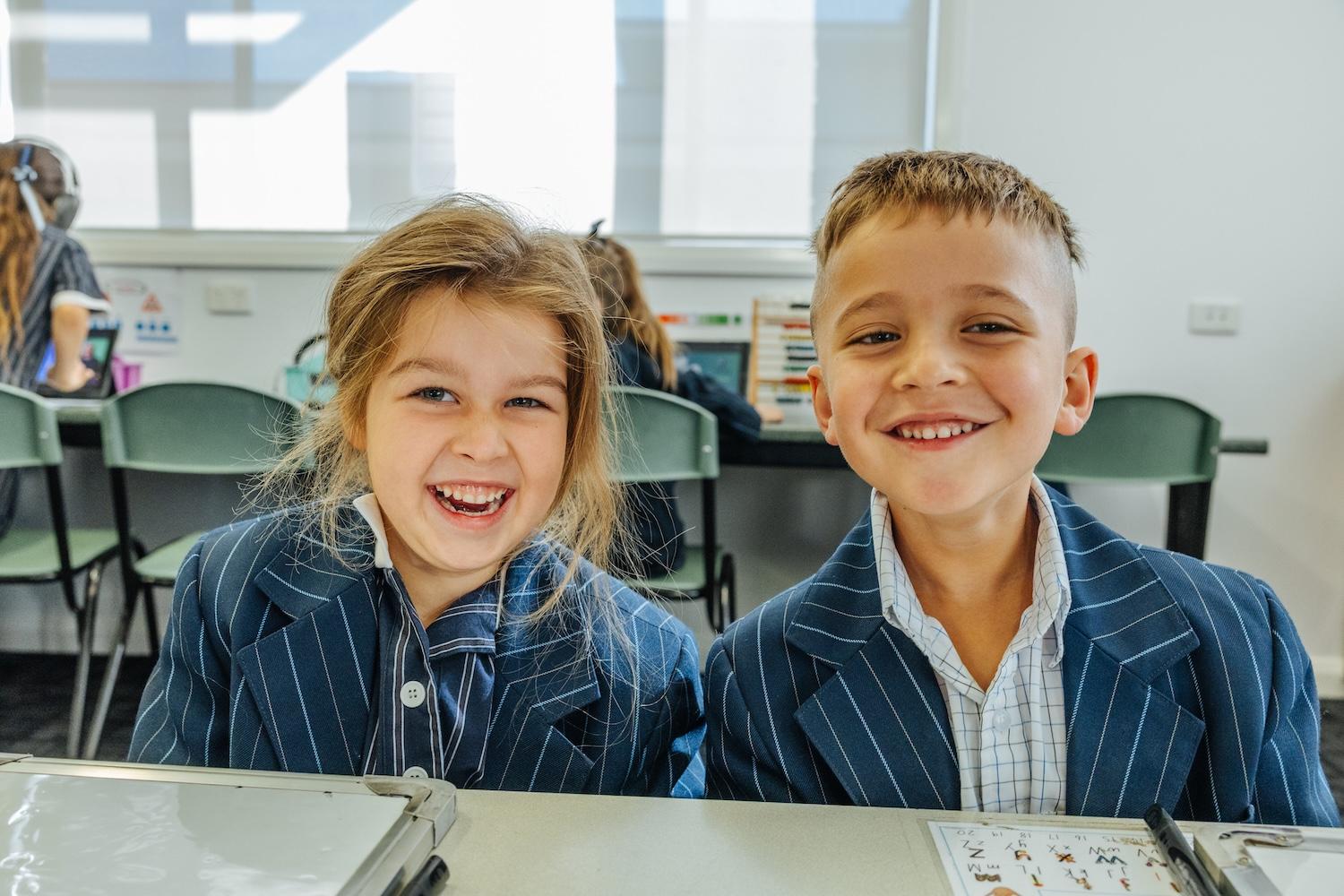 Bursting with giggles and bright-eyed wonder, two young students at ACC Echuca light up the classroom—because here, even the smallest voices are heard and celebrated.