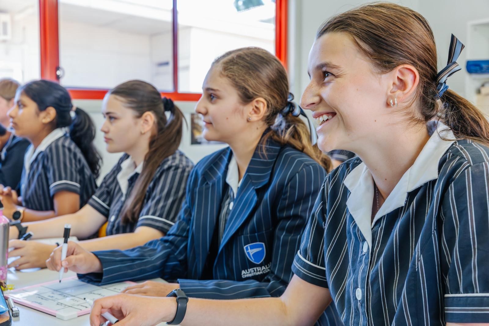 Secondary students listen and respond during a lesson, reflecting the active engagement and purpose-driven learning culture at ACC Echuca.