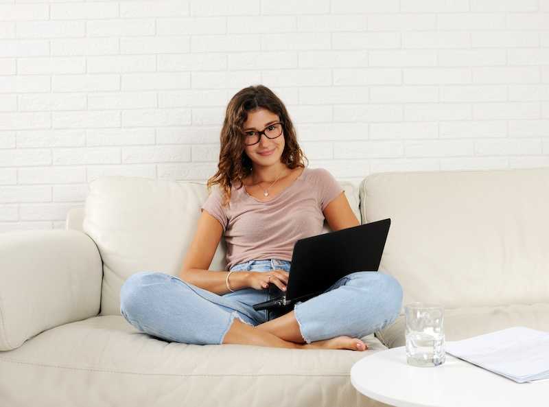 Distance education student working from her loungeroom