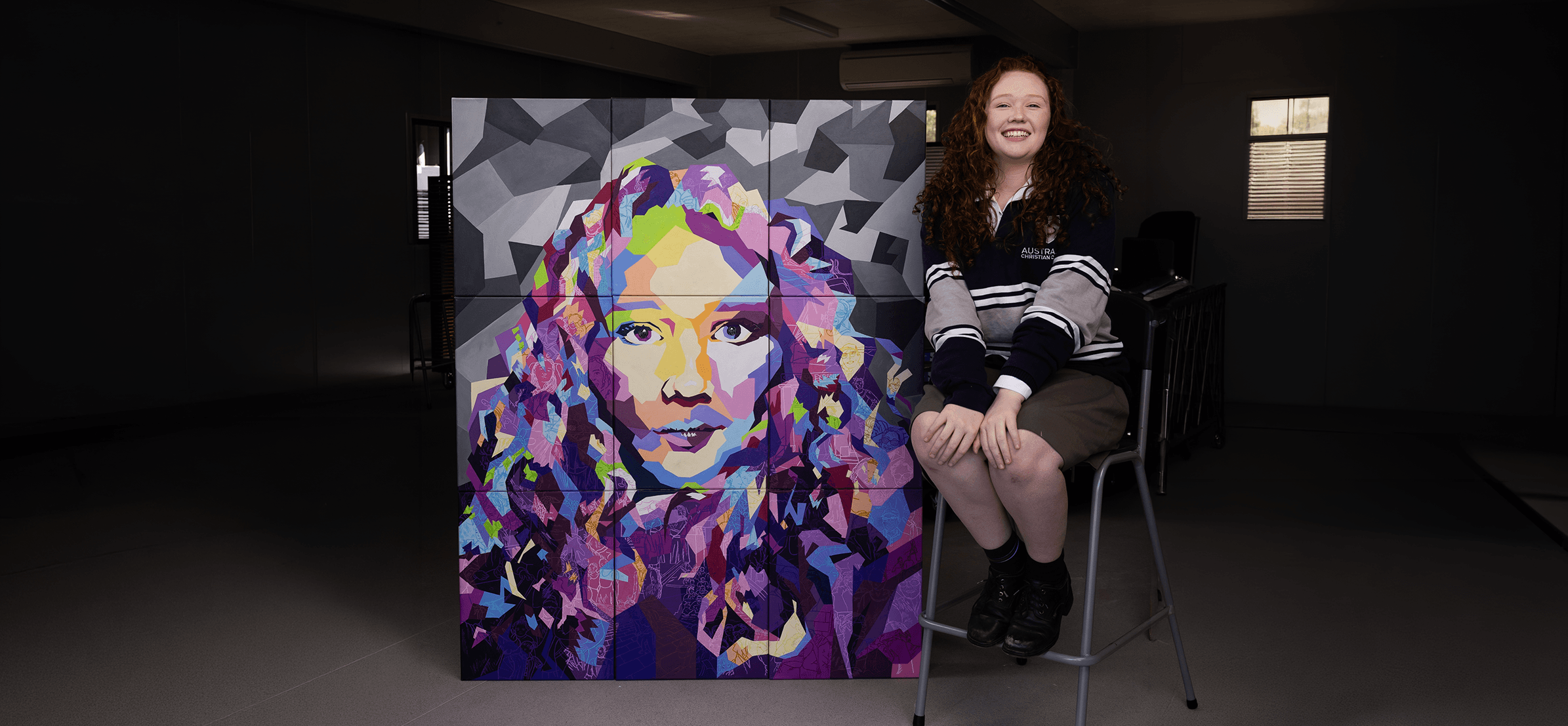 Student painting at an easel during a creative activity