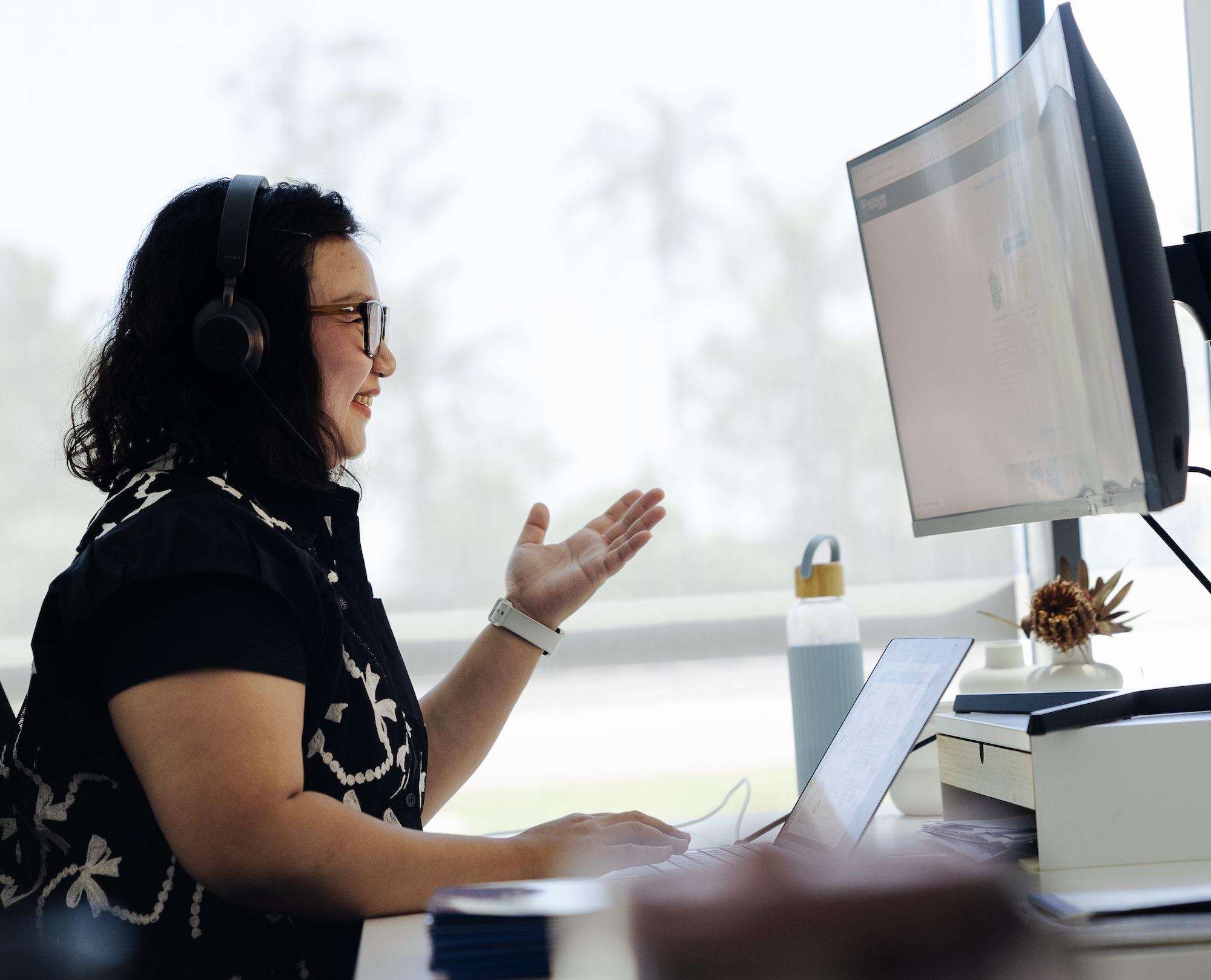 Distance education teacher supporting student over a video call