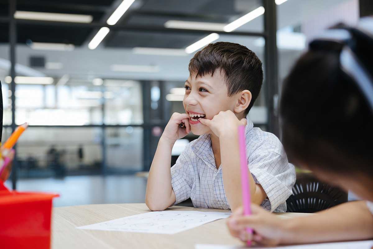 Smiling boy with developing character in ACC Marsden Park classroom