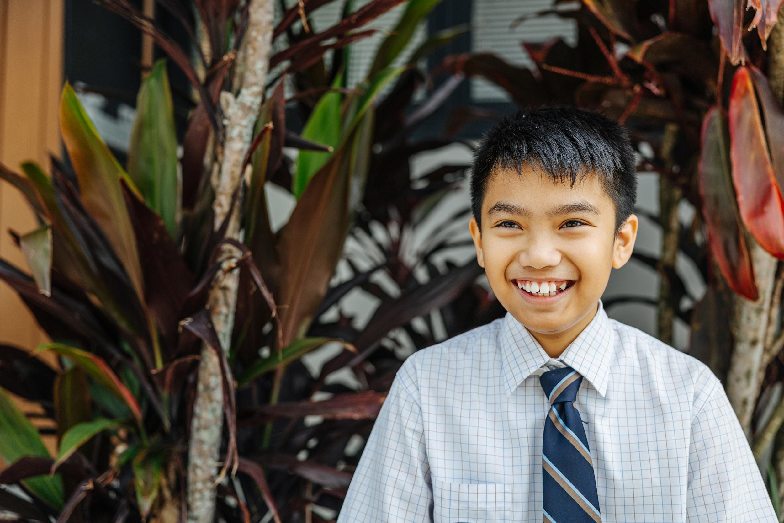 ACC Moreton student smiling in uniform on campus