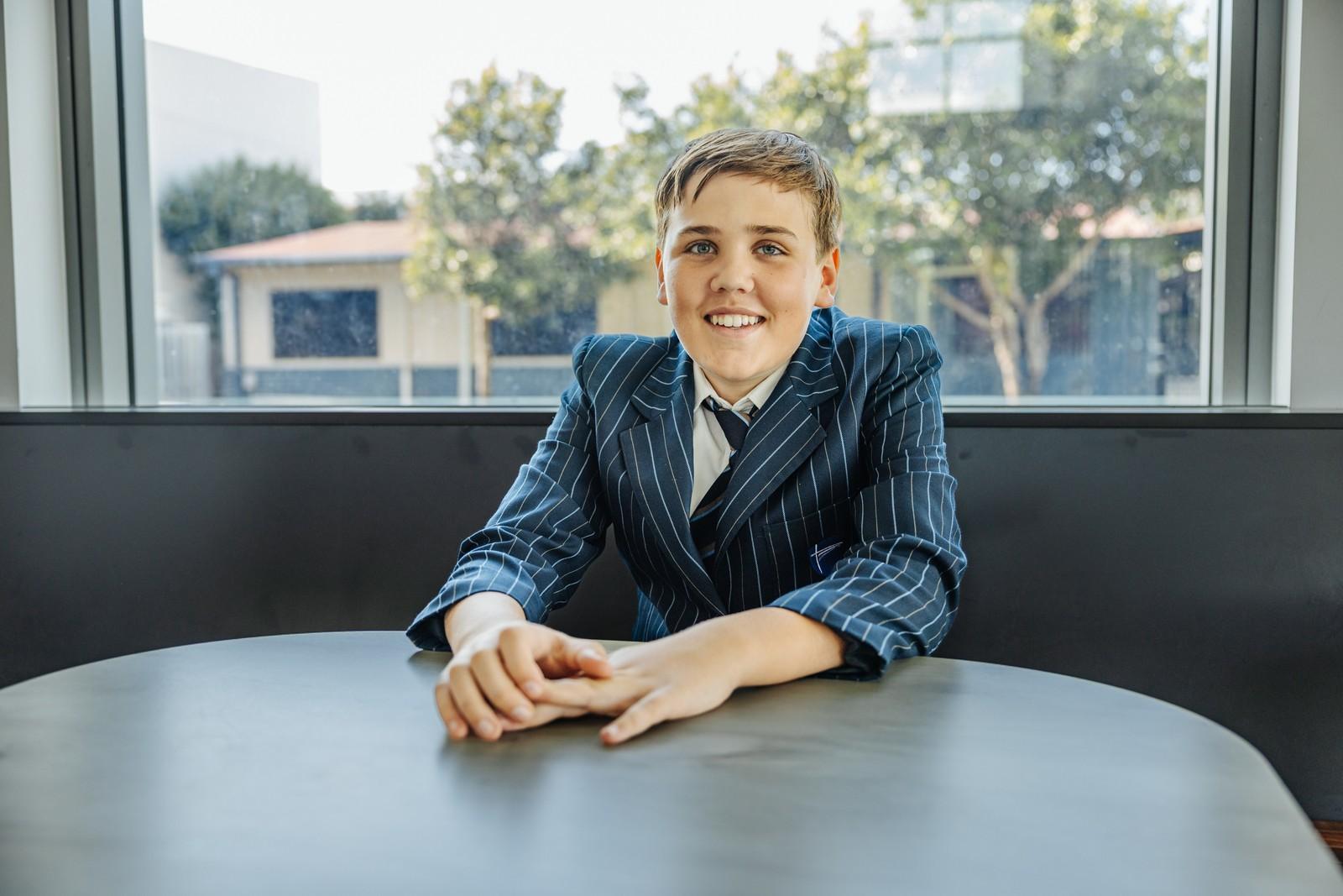 ACC Moreton student in uniform smiling during an enrolment interview