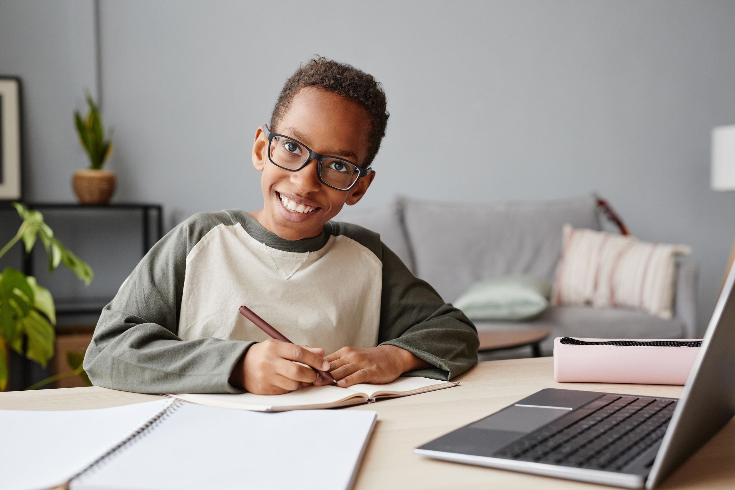 Primary student playing on school playground equipment at ACC Moreton.