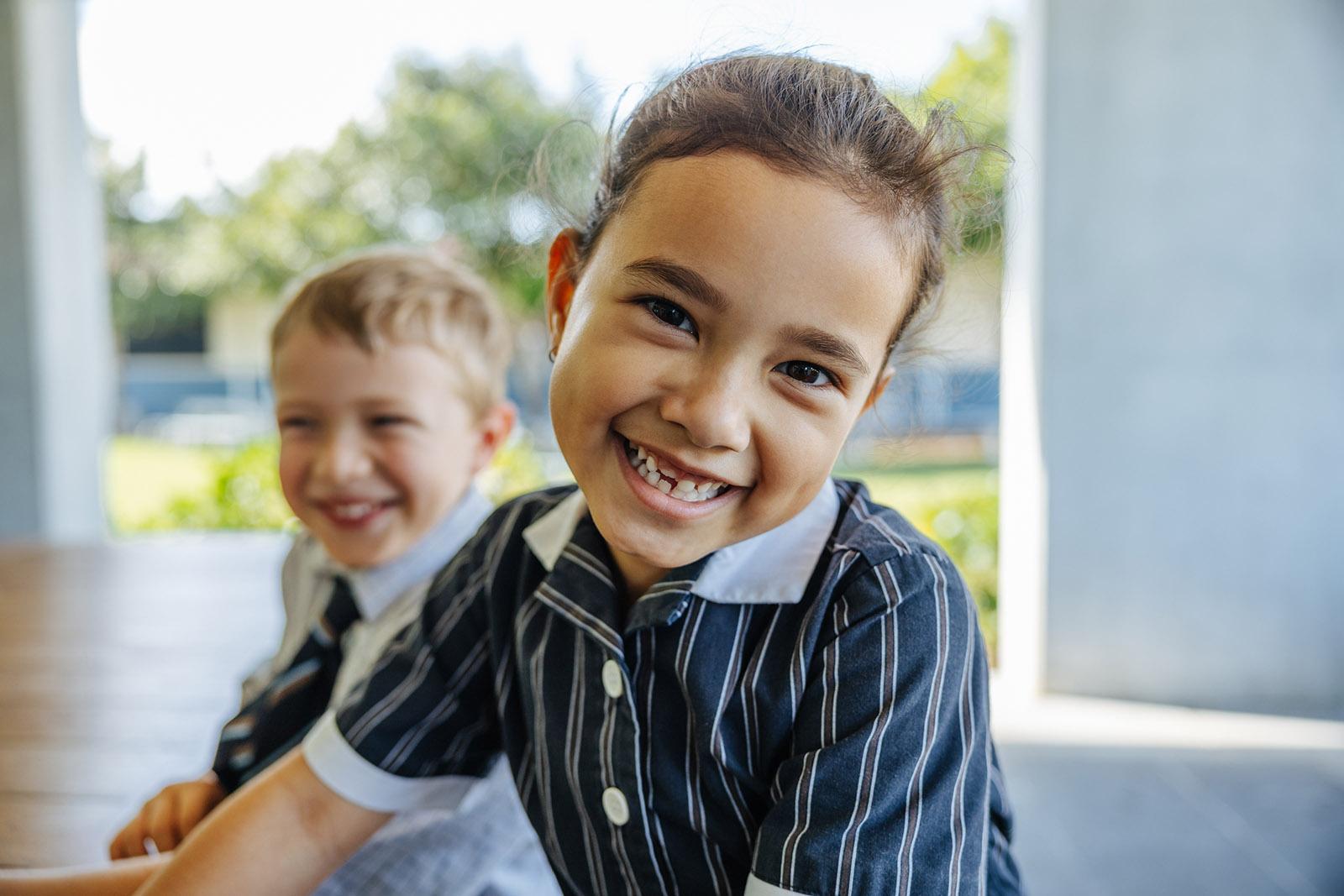 An ACC Moreton teacher supporting a student during class work