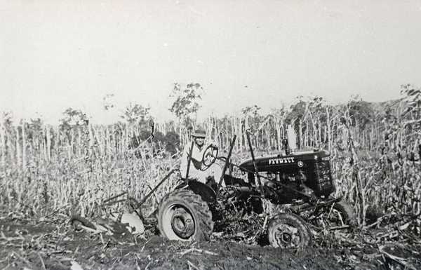 Wamuran Historical Photo: farmer on a tractor ploughing his farm circa 1935