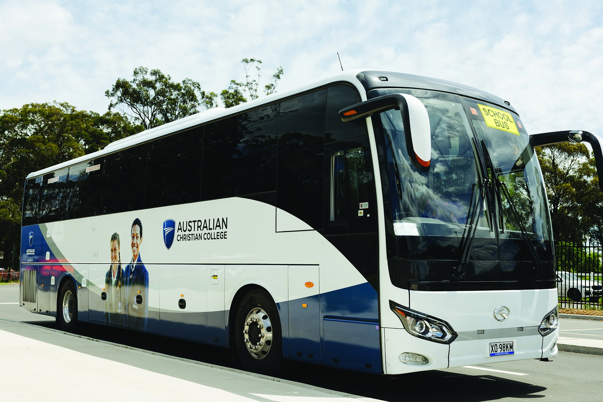 ACC Moreton private bus with decal of students on the side