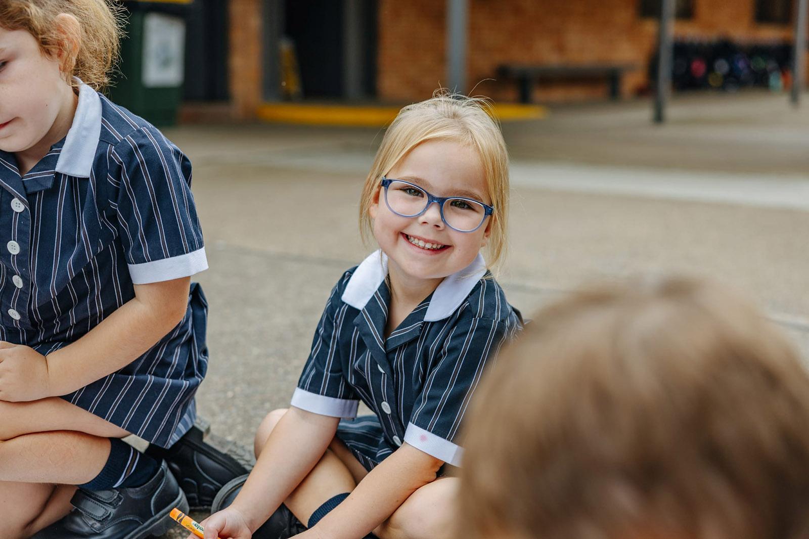 Smiling Kindy student at Australian Christian College Singleton, symbolising personalised early years education.