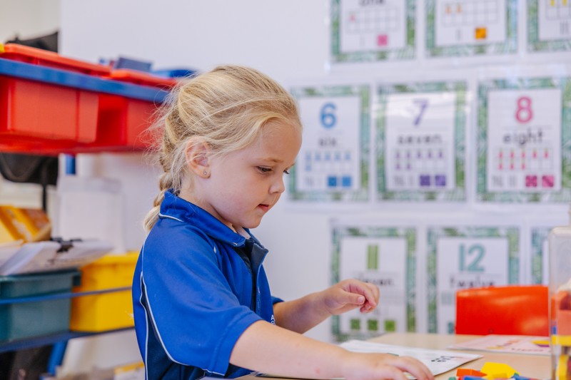 Boy and girl Kindergarten students from Singleton learning together at co-educational school