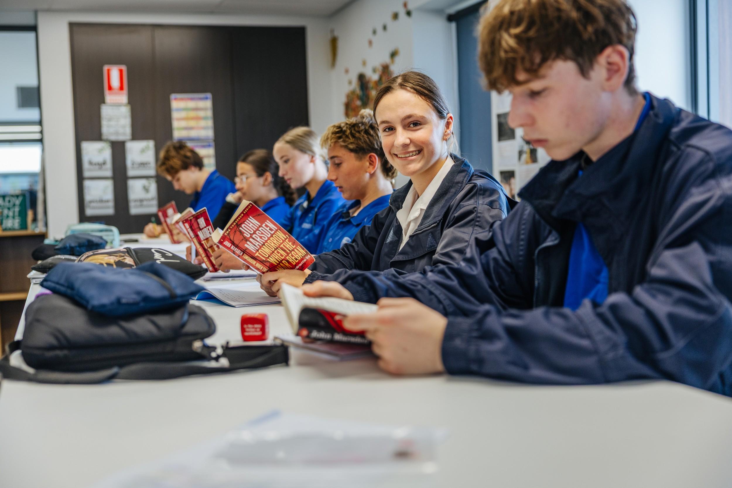 Secondary students reading in a classroom at ACC Southlands Albany