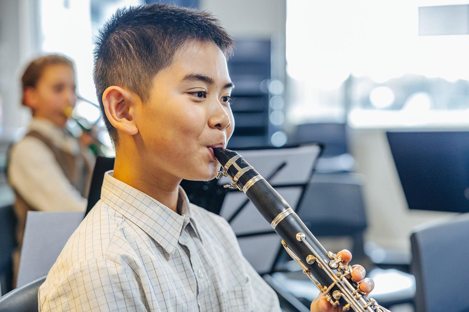 Primary students playing trombones in a concert band in Albany WA