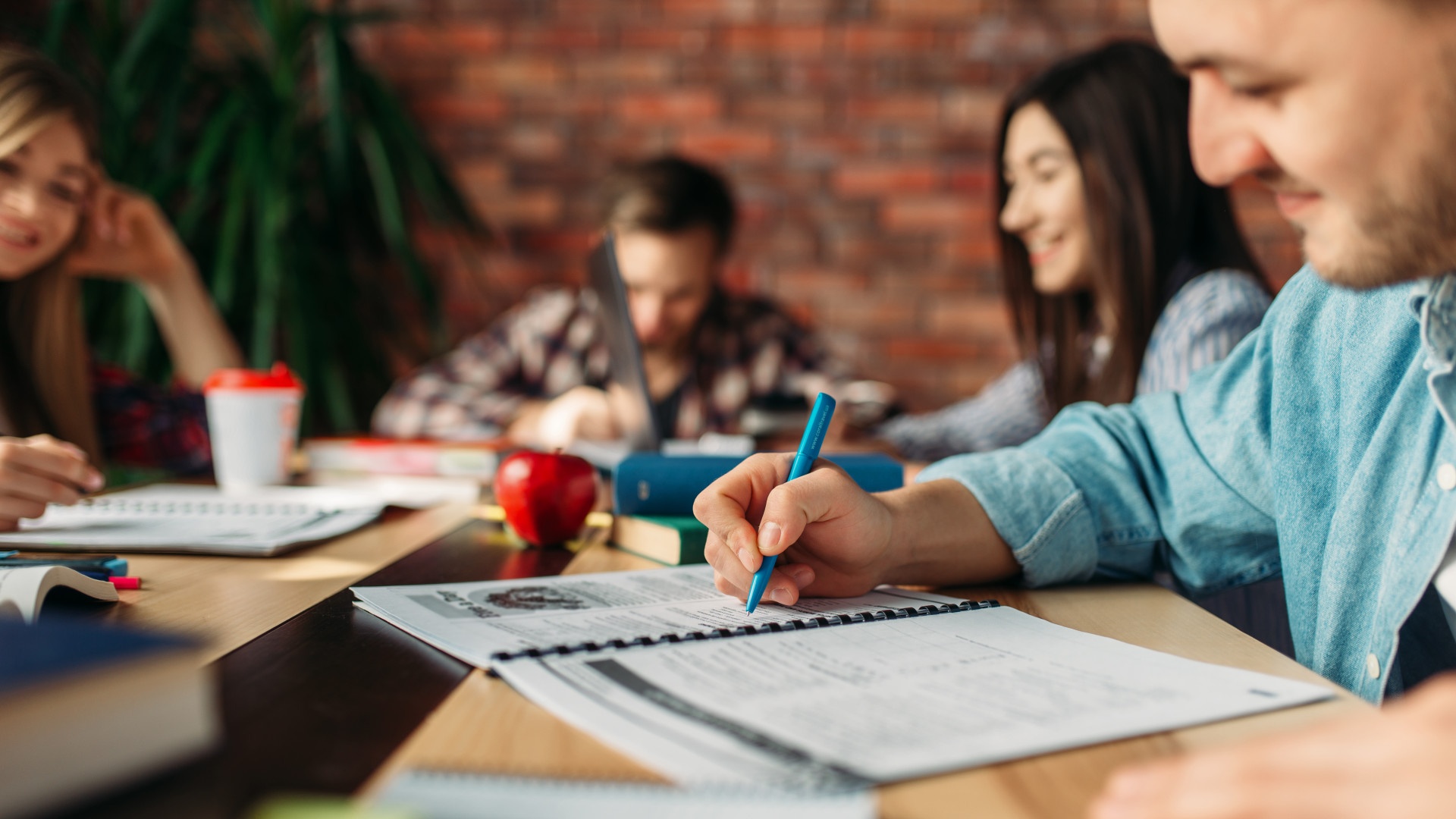 a group of students conducting research for academic journal