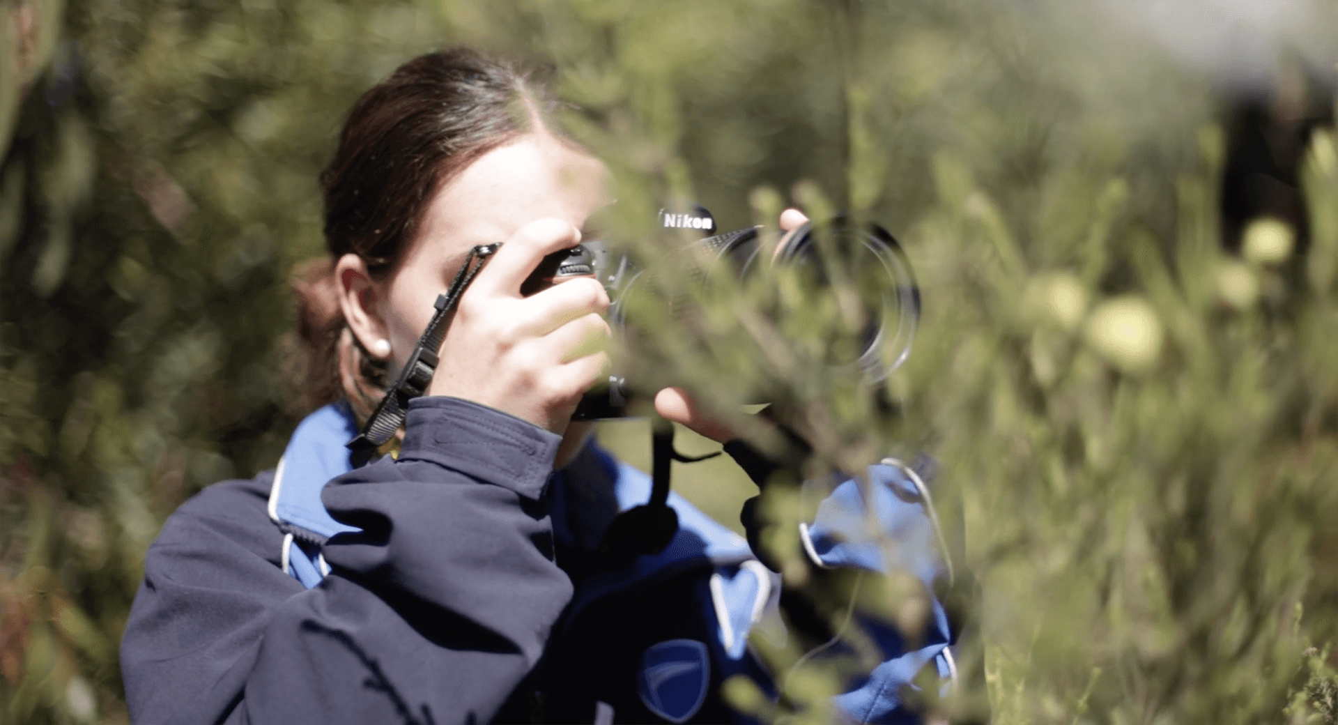 student taking a photograph